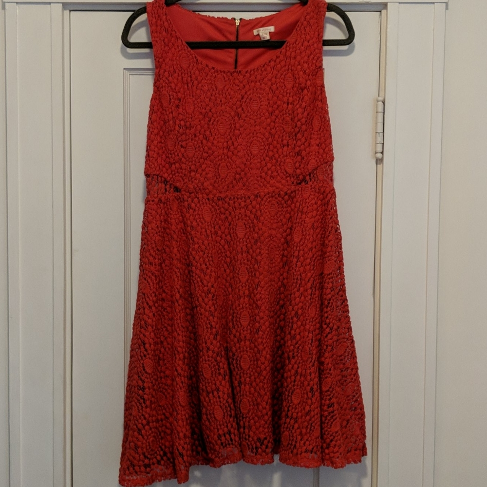 Pink lace skater dress with cutouts